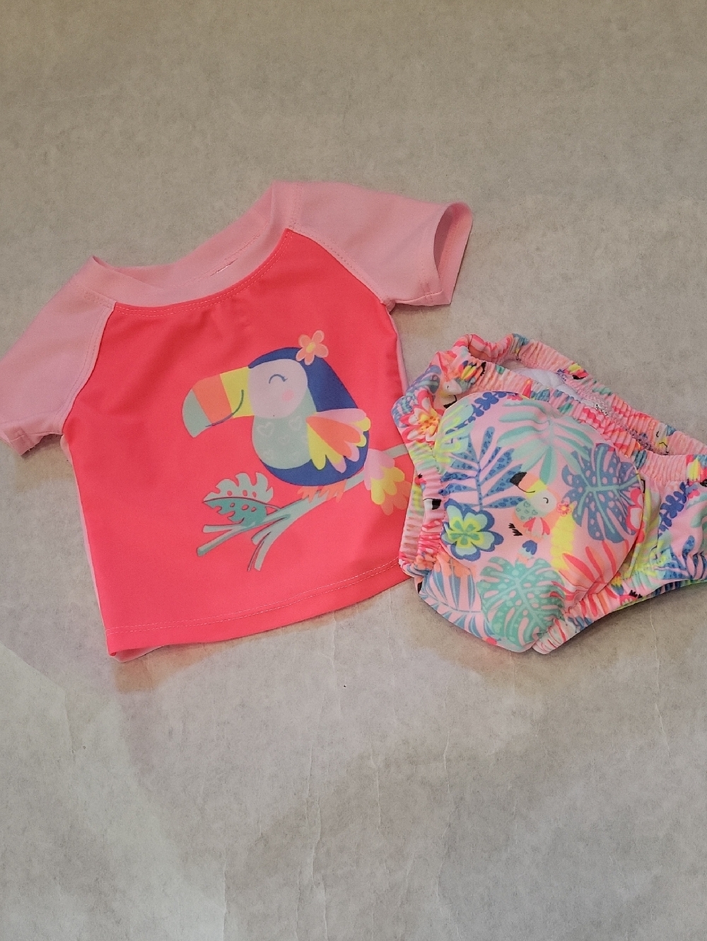 Pink toucan rash guard with matching swim diaper